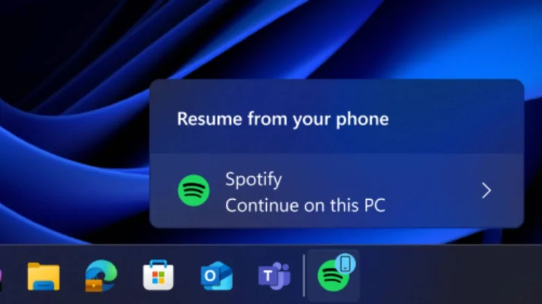 Spotifyなどのアプリのアクティビティをスマートフォンで再開できるWindows 11の新機能。(画像提供: Microsoft)