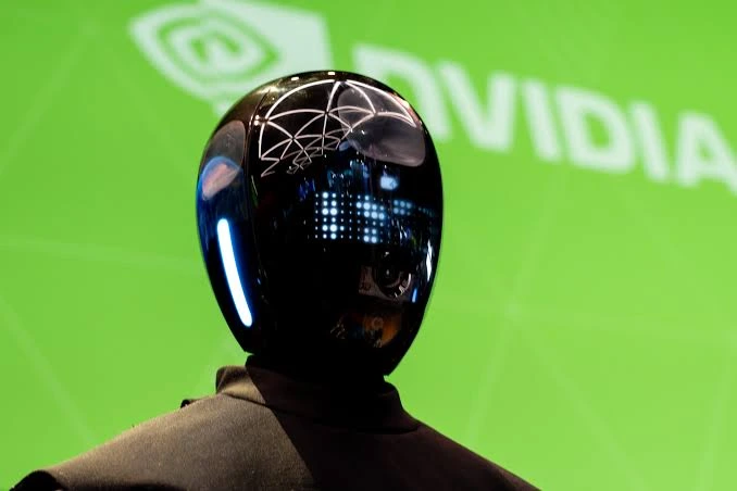 NVIDIAのロボット安全プラットフォーム「Halos for Robotics」のイメージ。工場内で人と協働する人型ロボットが安全に作業を行う様子。